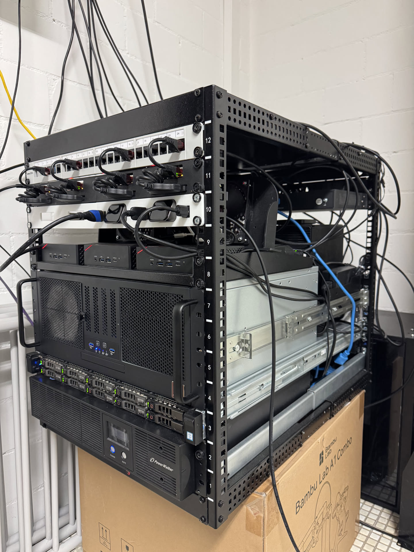 My 12U homelab rack, with the 4U AI node in the middle